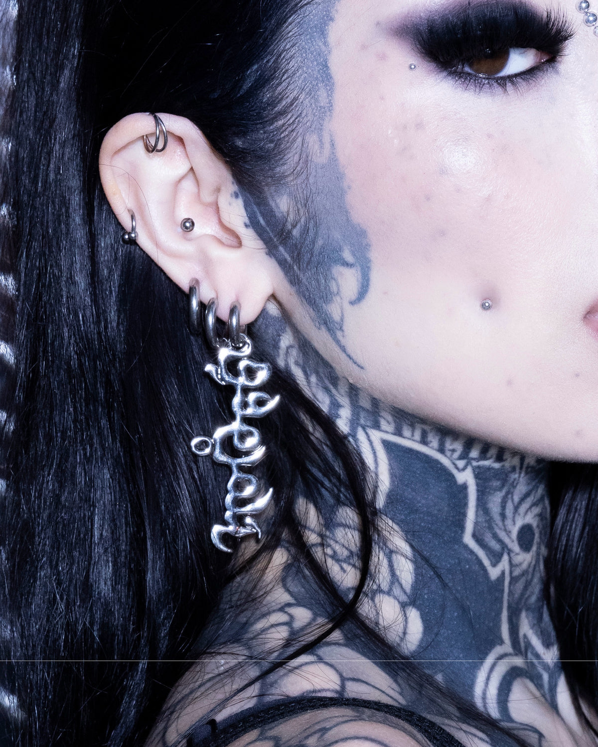 Nuwa logo earring